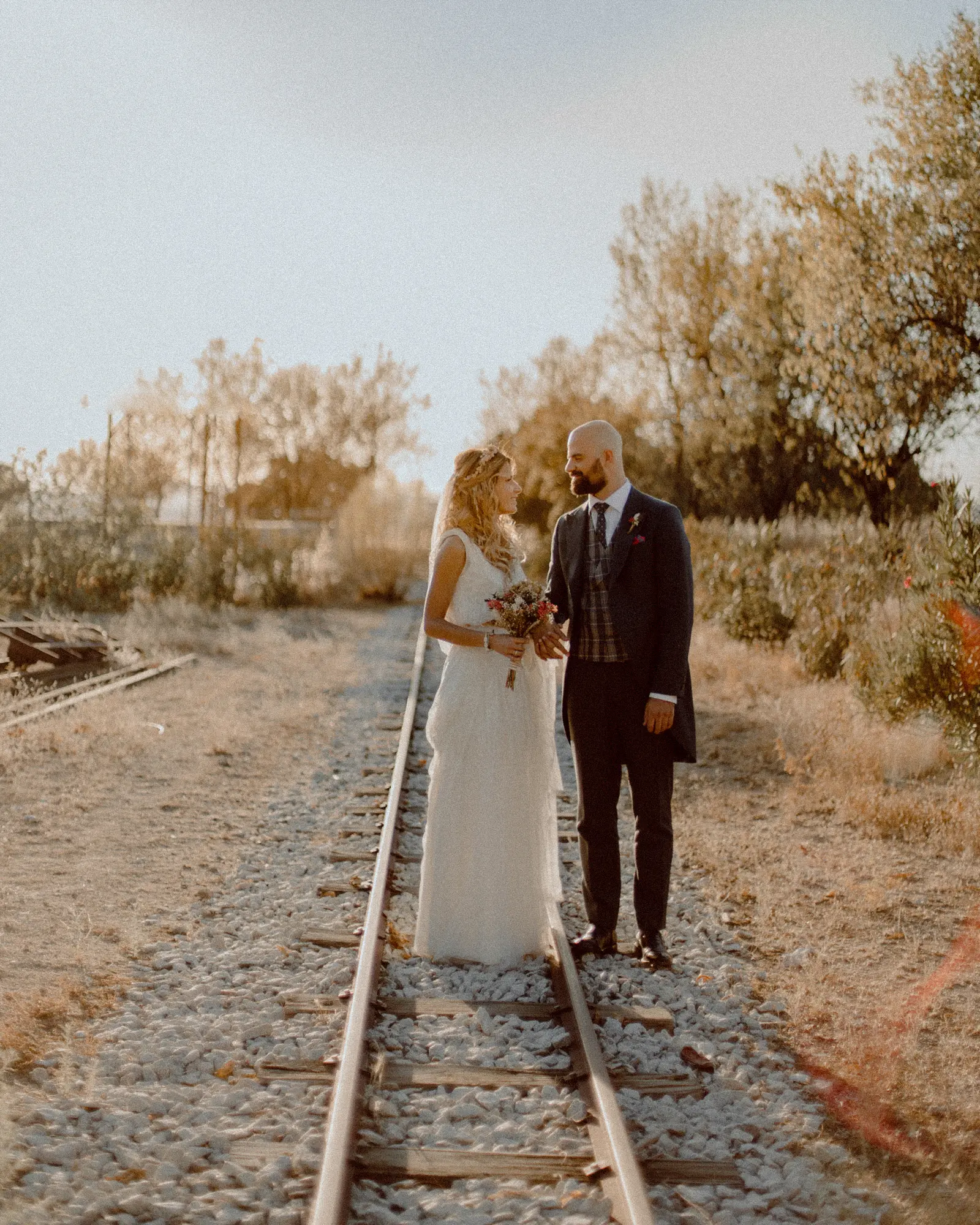 Couple walking together at sunset in Spain